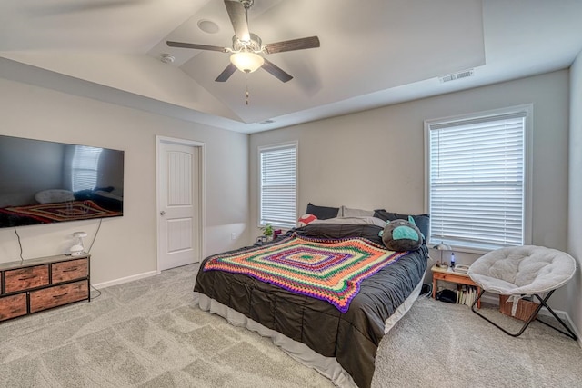 bedroom with ceiling fan, light carpet, and lofted ceiling