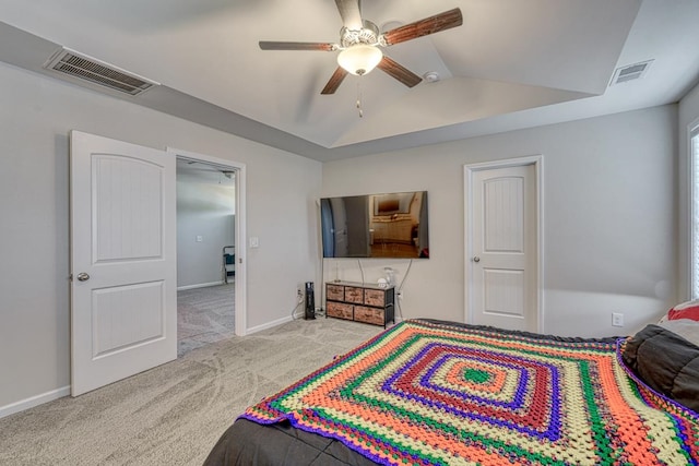 bedroom featuring light carpet, lofted ceiling, and ceiling fan