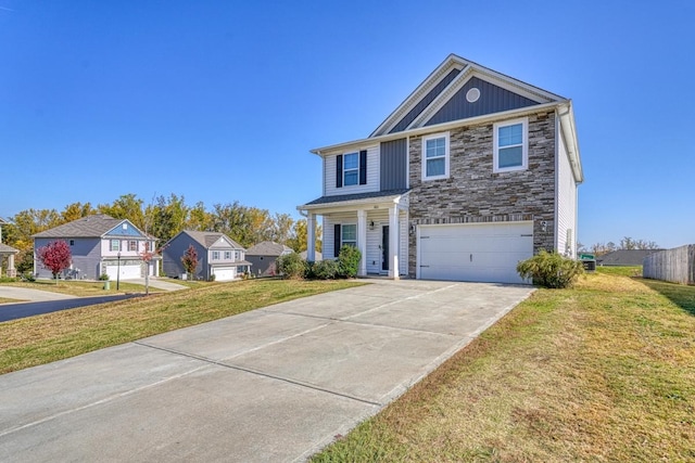 view of front facade with a front yard and a garage