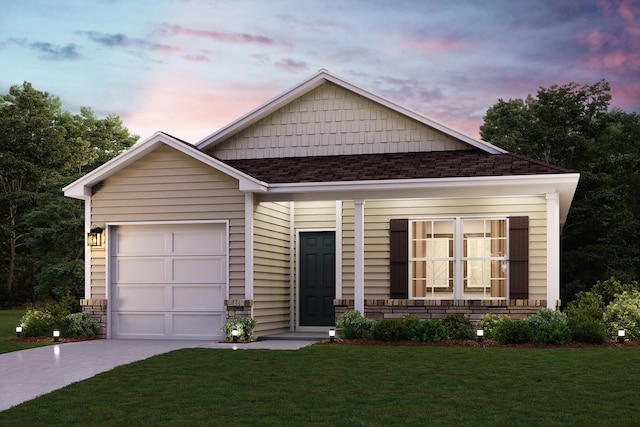 view of front of house with a yard, a garage, and a porch