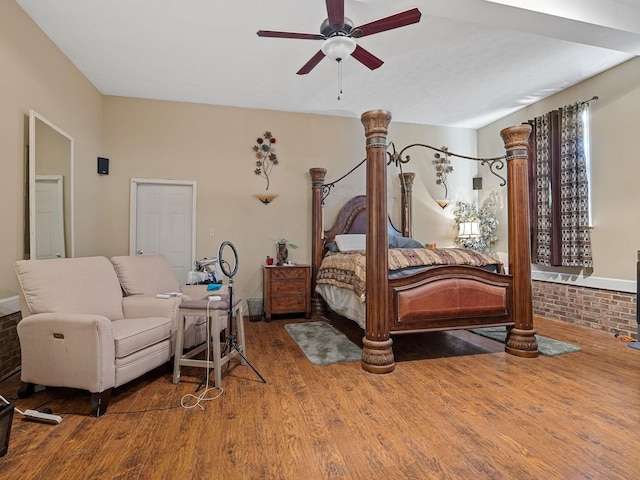 bedroom with wood-type flooring and ceiling fan