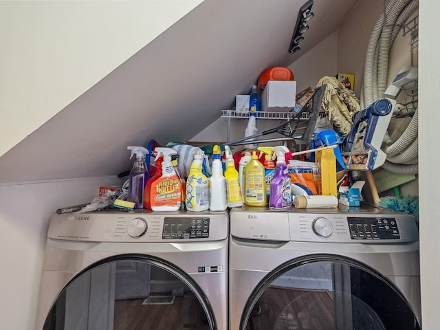 clothes washing area featuring independent washer and dryer