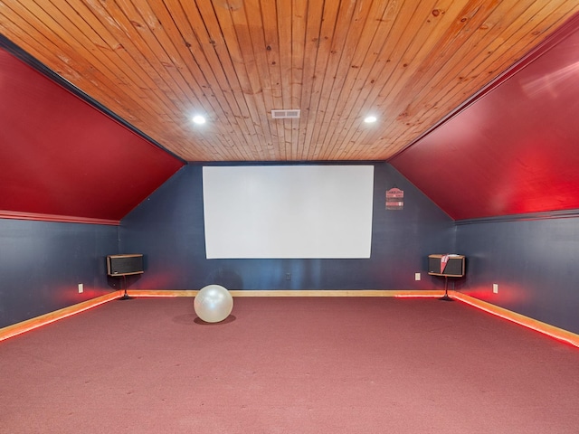 carpeted cinema with wood ceiling and vaulted ceiling