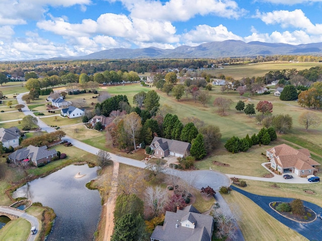 bird's eye view featuring a water and mountain view