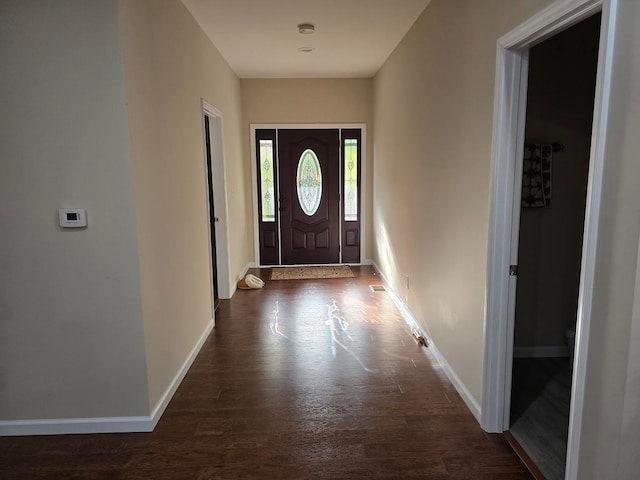 doorway featuring dark hardwood / wood-style flooring