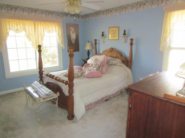 bedroom featuring carpet floors and ceiling fan