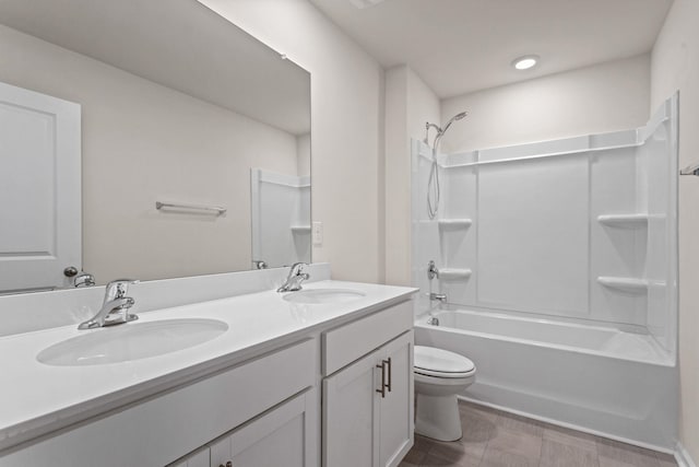 full bathroom with vanity, shower / bathing tub combination, and toilet