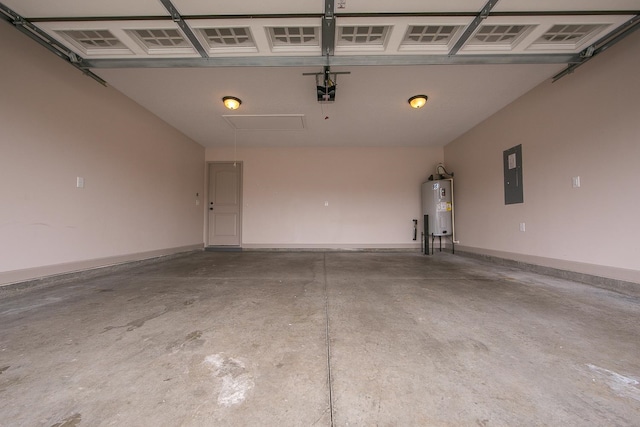 garage featuring electric panel, water heater, and a garage door opener