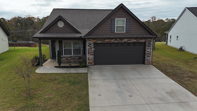 craftsman-style home featuring a garage and a front lawn