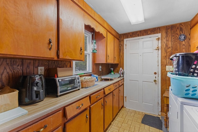 kitchen with wood walls