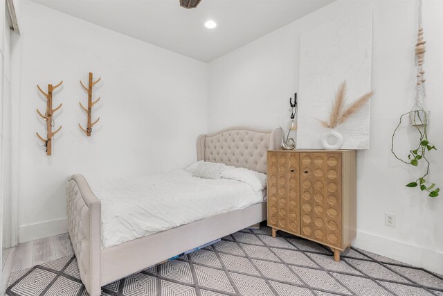 bedroom featuring hardwood / wood-style floors