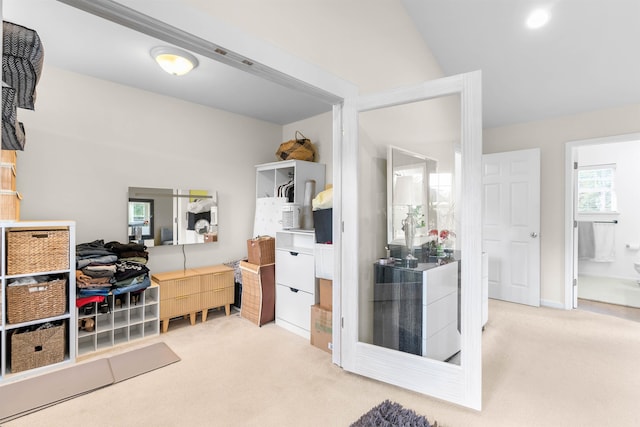 carpeted bedroom with ensuite bath