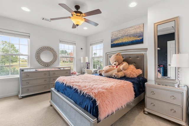 carpeted bedroom featuring ceiling fan