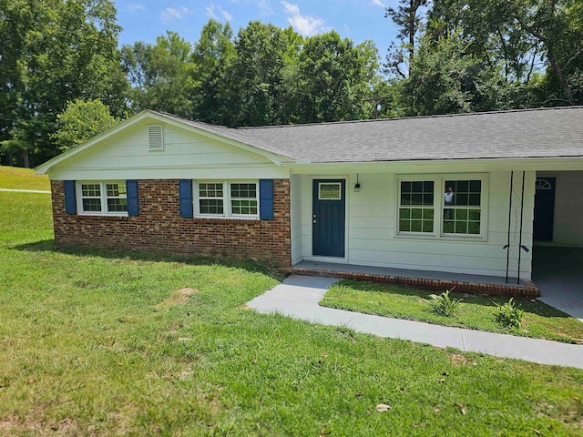 ranch-style house with a front yard