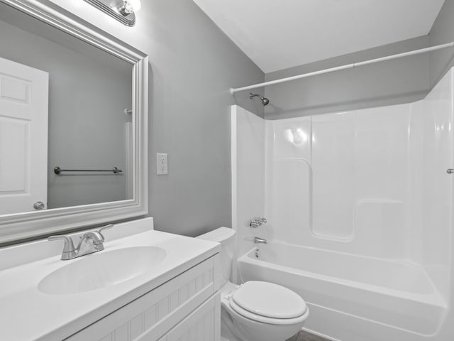 full bathroom featuring vanity, toilet, and bathtub / shower combination