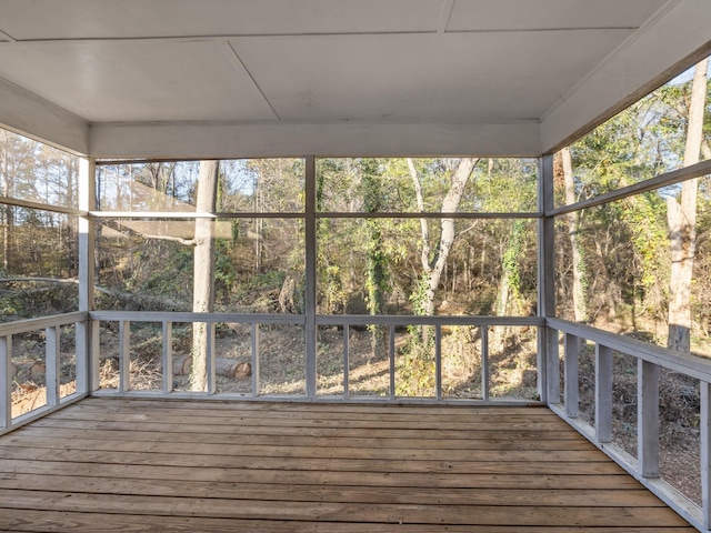 unfurnished sunroom with a wealth of natural light