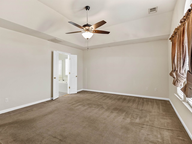 carpeted empty room with ceiling fan