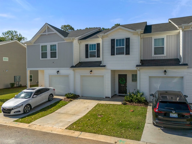 multi unit property featuring a garage