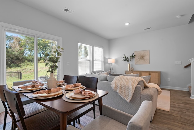 dining room with dark hardwood / wood-style floors