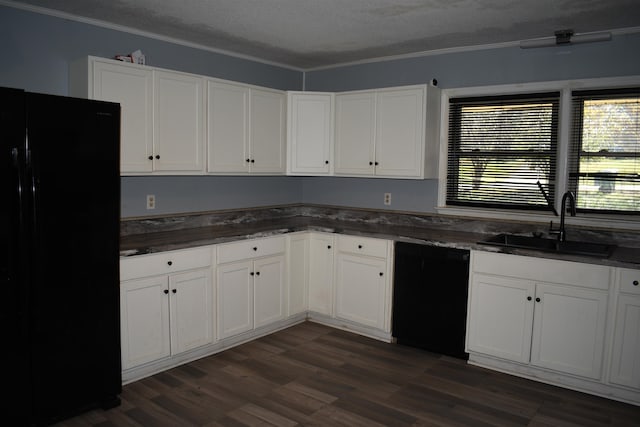 kitchen featuring black appliances, ornamental molding, white cabinetry, a textured ceiling, and sink