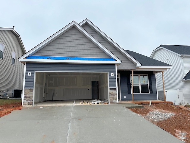 craftsman-style home featuring a garage