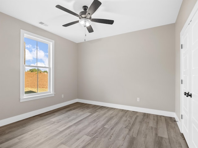 unfurnished bedroom with light hardwood / wood-style flooring and ceiling fan