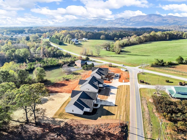 drone / aerial view featuring a mountain view