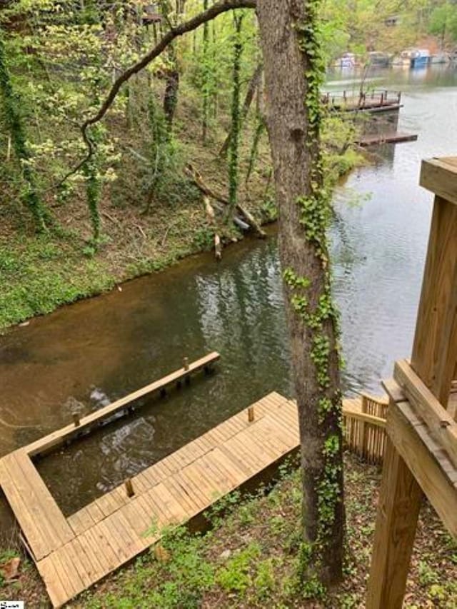 view of dock with a water view