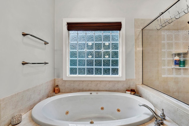 bathroom with tiled bath