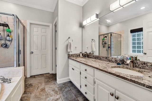 bathroom with vanity, ornamental molding, and shower with separate bathtub