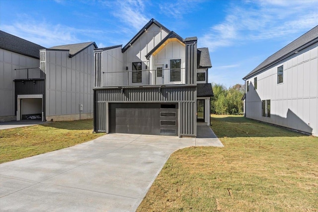 view of front of home featuring a balcony, a garage, and a front lawn