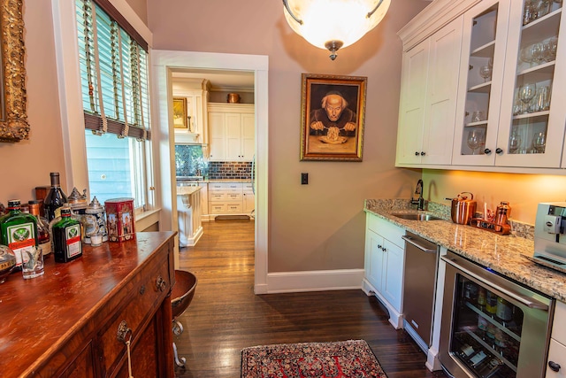 bar with white cabinetry, wine cooler, dark hardwood / wood-style floors, dishwasher, and decorative backsplash