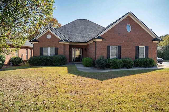 front facade with a front lawn