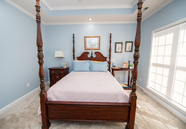 bedroom with light colored carpet and crown molding