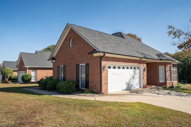 view of front of property with a garage and a front yard