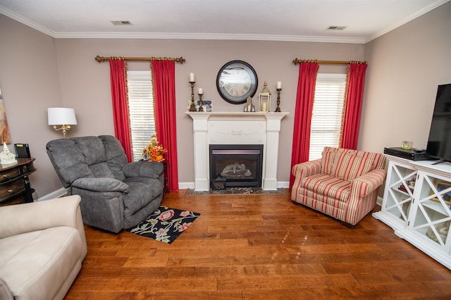 living room featuring wood-type flooring and crown molding