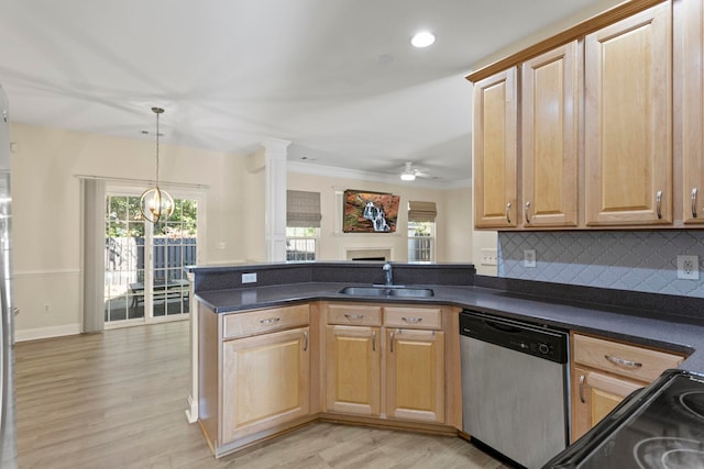 kitchen featuring decorative backsplash, light wood-type flooring, sink, and stainless steel appliances