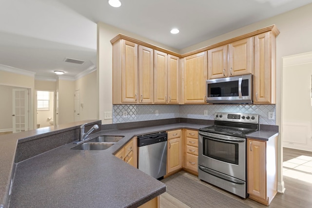 kitchen with stainless steel appliances, light hardwood / wood-style floors, sink, light brown cabinetry, and crown molding