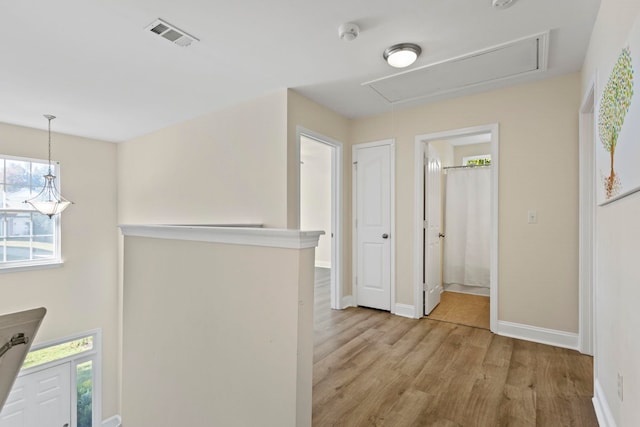 hall featuring light hardwood / wood-style flooring