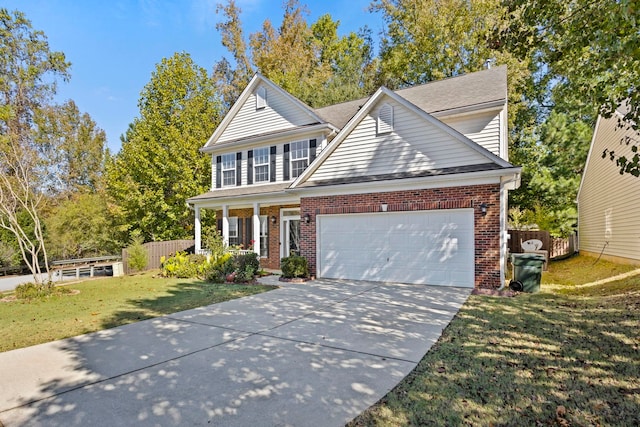 view of property with a front yard and covered porch