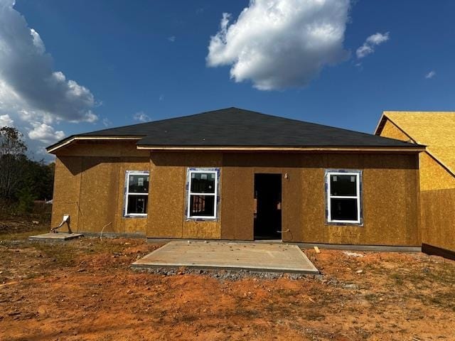 rear view of house with a patio