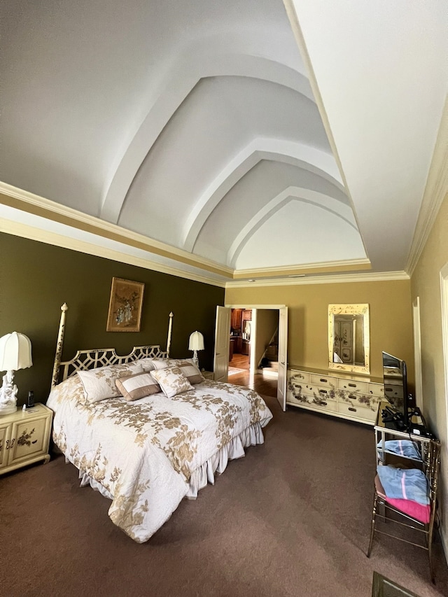 bedroom with vaulted ceiling, ornamental molding, and carpet floors