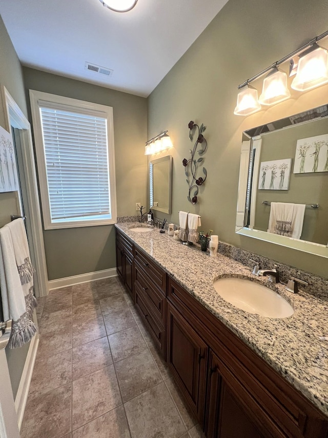 bathroom featuring vanity and tile patterned floors