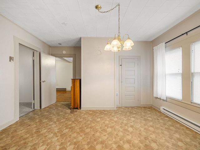 unfurnished room featuring carpet, an inviting chandelier, and a baseboard heating unit