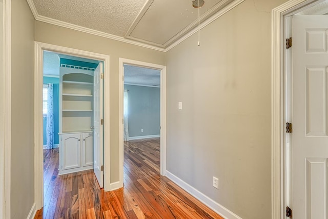 9 Brookdale Acres, Lyman, SC 29365 - hallway with attic access, wood finished floors, a textured ceiling, baseboards, and crown molding