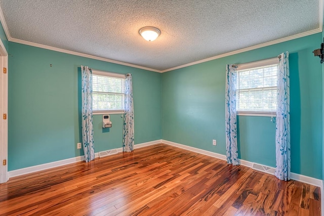 9 Brookdale Acres, Lyman, SC 29365 - unfurnished room featuring wood finished floors, a textured ceiling, crown molding, and baseboards