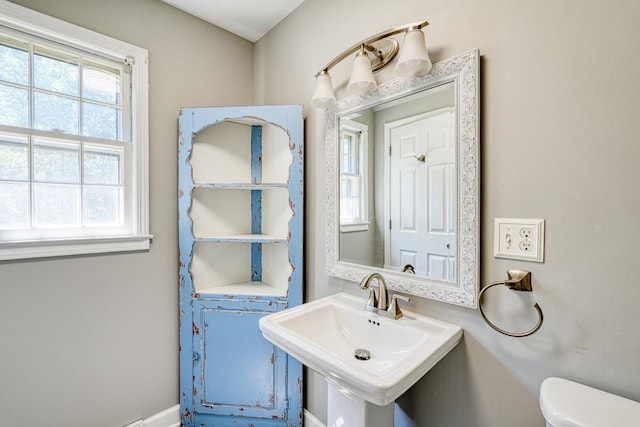 bathroom with toilet and sink