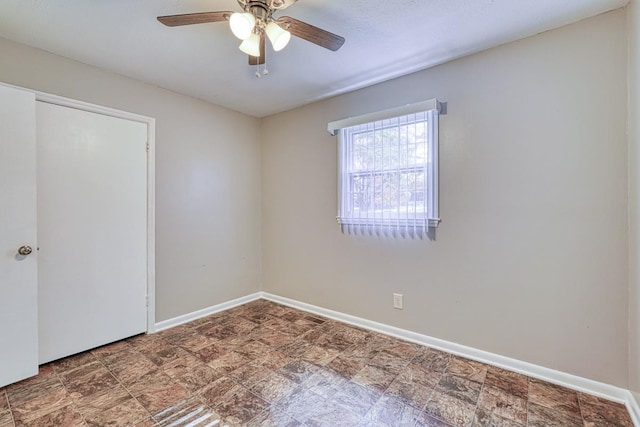 unfurnished room featuring ceiling fan