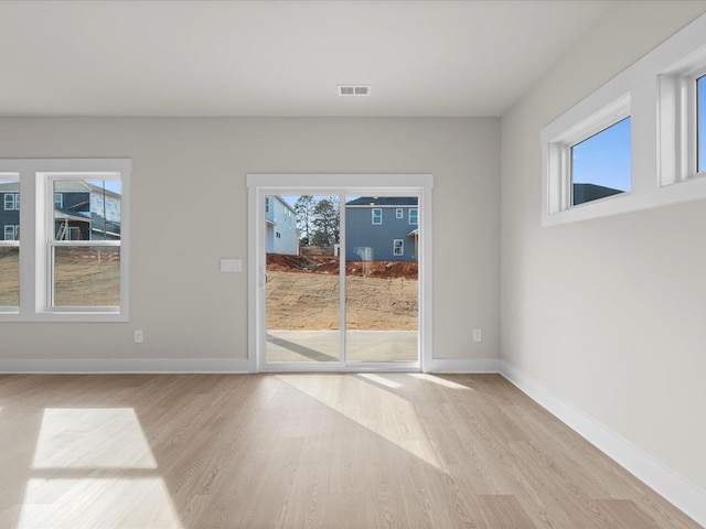 interior space featuring plenty of natural light and light wood-type flooring