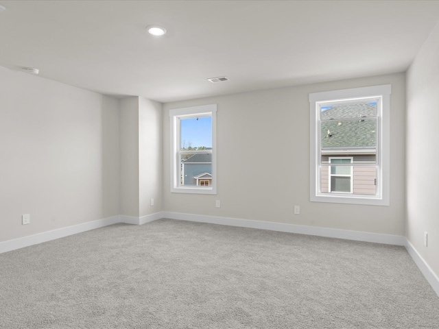 view of carpeted spare room